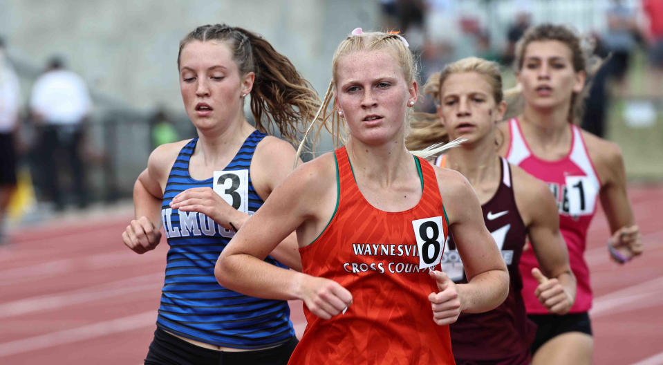 Waynesville's Samantha Erbach improved from her runner-up finish at the 2022 regional meet to win this year's race at Troy High School.