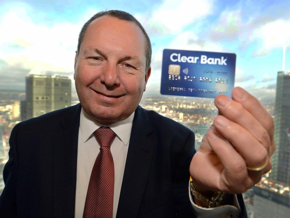 Nick Ogden holding card at ClearBank press launch 3