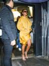 <p>In a mustard yellow Fenty hoodie dress with a satin skirt, layered necklaces, rectangular sunglasses, and heeled sandals while out in LA. </p>