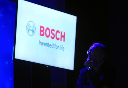 Werner Struth, member of the board of management of Robert Bosch GmbH, watches a video during a Bosch news conference at the 2017 CES in Las Vegas, Nevada, U.S., January 4, 2017. REUTERS/Steve Marcus