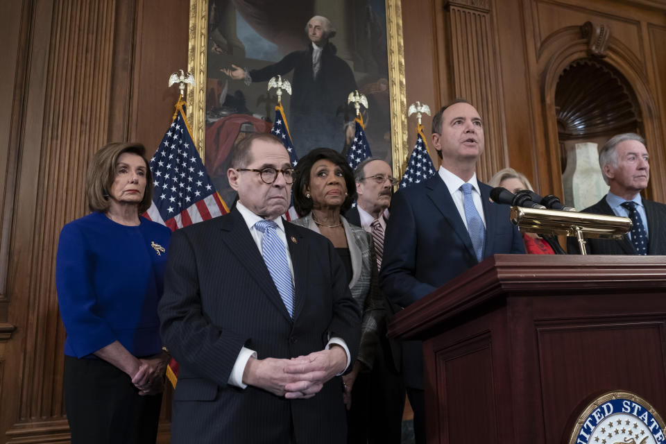 From left, Speaker of the House Nancy Pelosi, D-Calif., House Judiciary Committee Chairman Jerrold Nadler, D-N.Y., House Financial Services Committee Chairwoman Maxine Waters, D-Calif., House Foreign Affairs Committee Chairman Eliot Engel, D-N.Y., House Intelligence Committee Chairman Adam Schiff, D-Calif., and House Ways and Means Committee Chairman Richard Neal, D-Mass., announce they are pushing ahead for two articles of impeachment against President Donald Trump — abuse of power and obstruction of Congress — charging he corrupted the U.S. election process and endangered national security in his dealings with Ukraine, at the Capitol in Washington, Tuesday, Dec. 10, 2019. (AP Photo/J. Scott Applewhite)