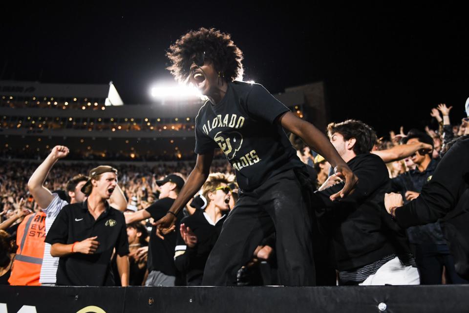 Colorado fans react after the Buffaloes tied a college football game against Colorado State at Folsom Field on Saturday, Sep. 16, 2023, in Boulder, Colo.