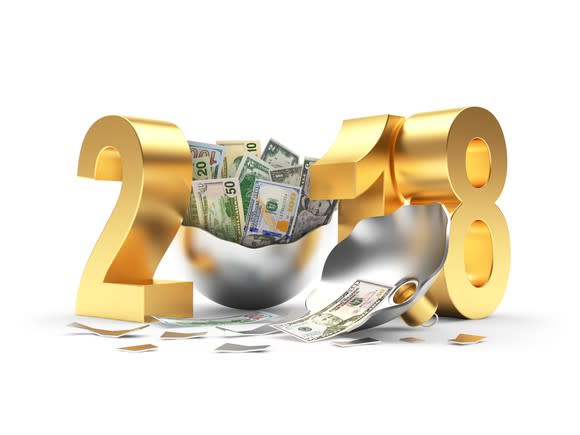 2018 with zero formed by opened silver bell full of cash