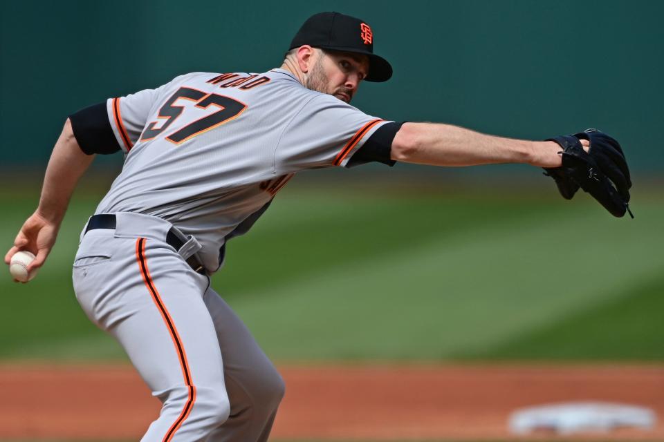 San Francisco Giants starting pitcher Alex Wood delivers in the third inning of a baseball game against the Cleveland Guardians, Sunday, April 17, 2022, in Cleveland. (AP Photo/David Dermer)