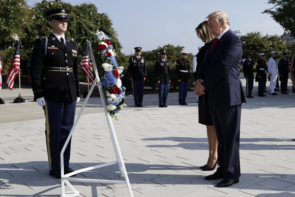 President Donald Trump and first lady Melania Trump pause after placing a wreath and will participate in a moment of silence honoring the victims of the Sept. 11 terrorist attacks, Wednesday, Sept. 11, 2019, at the Pentagon. (AP Photo/Evan Vucci)