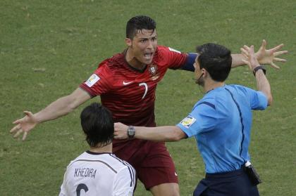 Portugal&amp;#39;s Cristiano Ronaldo protests to referee Milorad Mazic during his team's loss to Germany. (AP)
