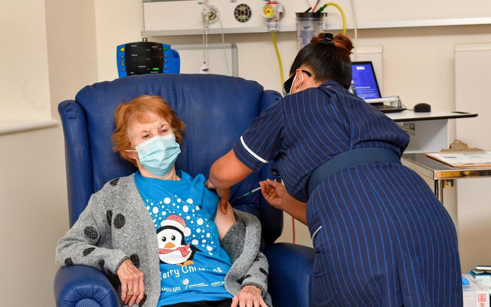 Margaret Keenan receives her vaccine - PA