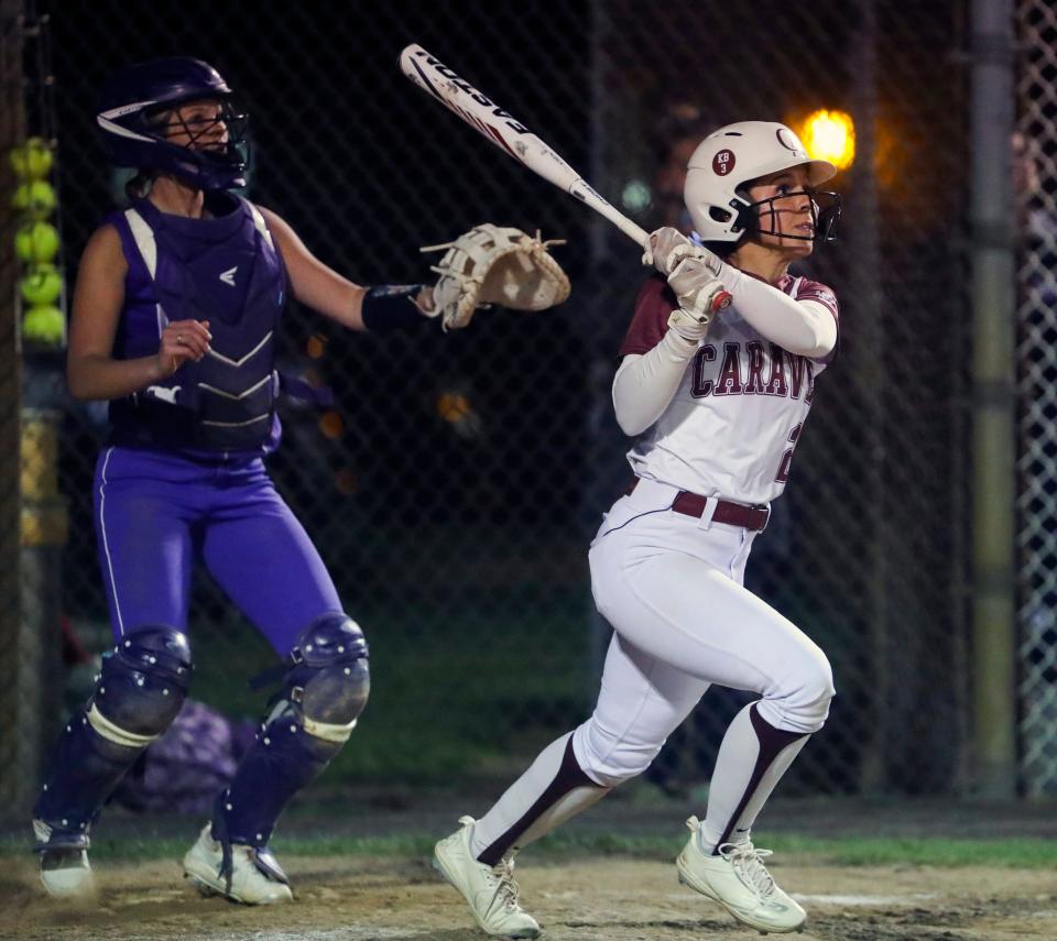 Caravel's Veronica Diomede ends the game with an RBI hit in the bottom of the eighth inning of the Bucs'  5-4 win against Delmarva Christian at Caravel Academy, Tuesday, April 25, 2023.