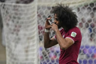 Qatar's Akram Afif celebrates after scoring his side's opening goal during the Asian Cup final soccer match between Qatar and Jordan at the Lusail Stadium in Lusail, Qatar, Saturday, Feb. 10, 2024. (AP Photo/Aijaz Rahi)