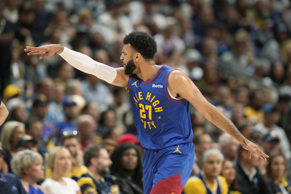 Denver Nuggets guard Jamal Murray argues for a call during the first half of the team's NBA basketball game against the Los Angeles Lakers on Tuesday, Oct. 24, 2023, in Denver. (AP Photo/David Zalubowski)