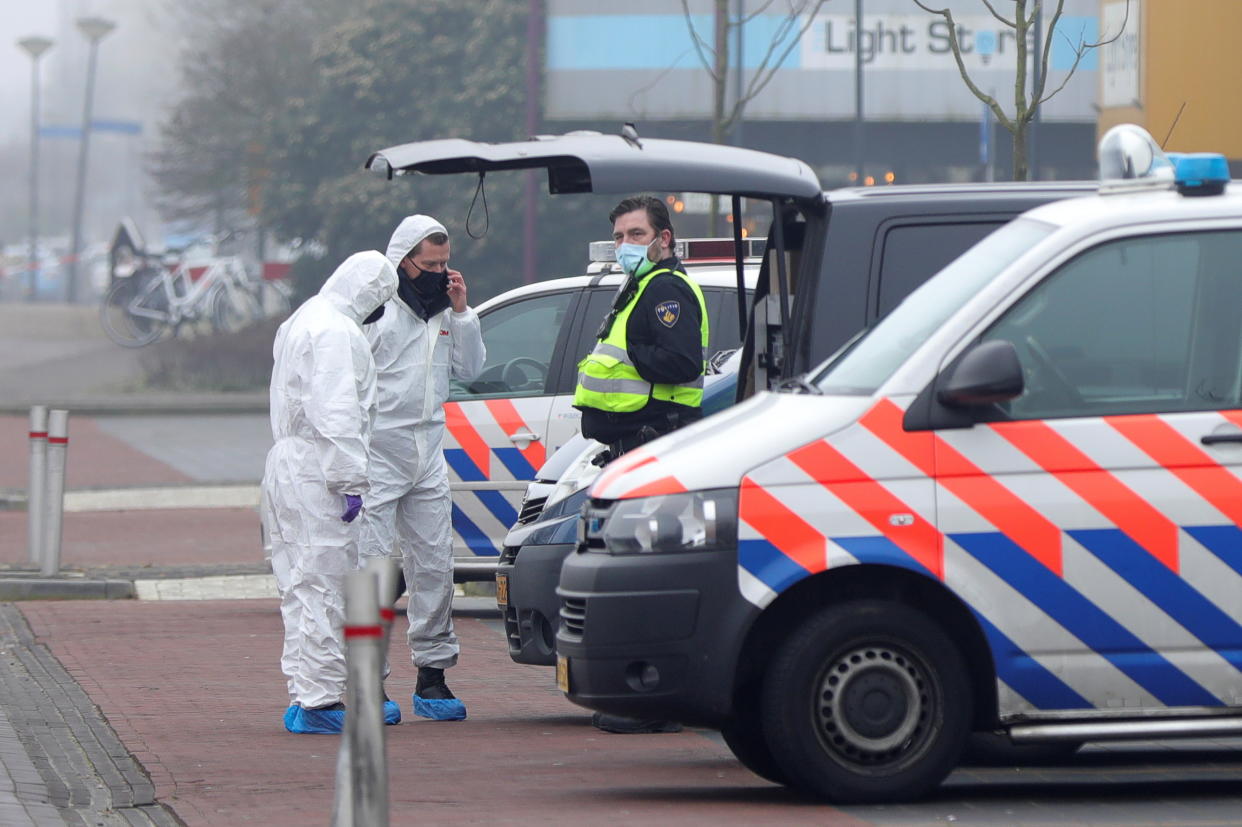 Forensic officers investigate the area at the scene of an explosion at a coronavirus disease (COVID-19) testing location in Bovenkarspel, near Amsterdam, Netherlands March 3, 2021. REUTERS/Eva Plevier