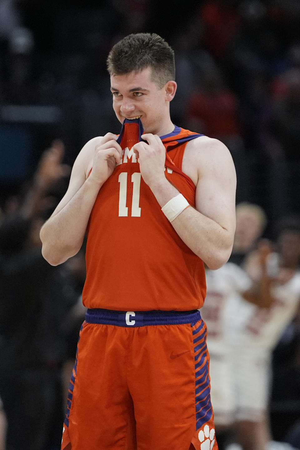 Clemson guard Joseph Girard III (11) bites on his jersey in the closing seconds of a loss to Alabama in an Elite 8 college basketball game in the NCAA tournament Saturday, March 30, 2024, in Los Angeles. (AP Photo/Ryan Sun)