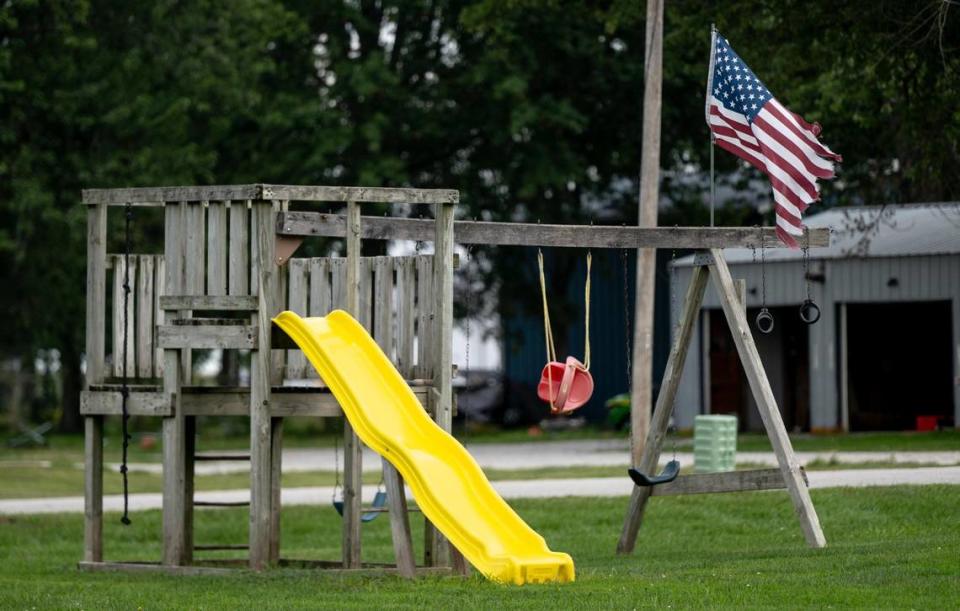 An American flag flies at playground in Center, Mo.
