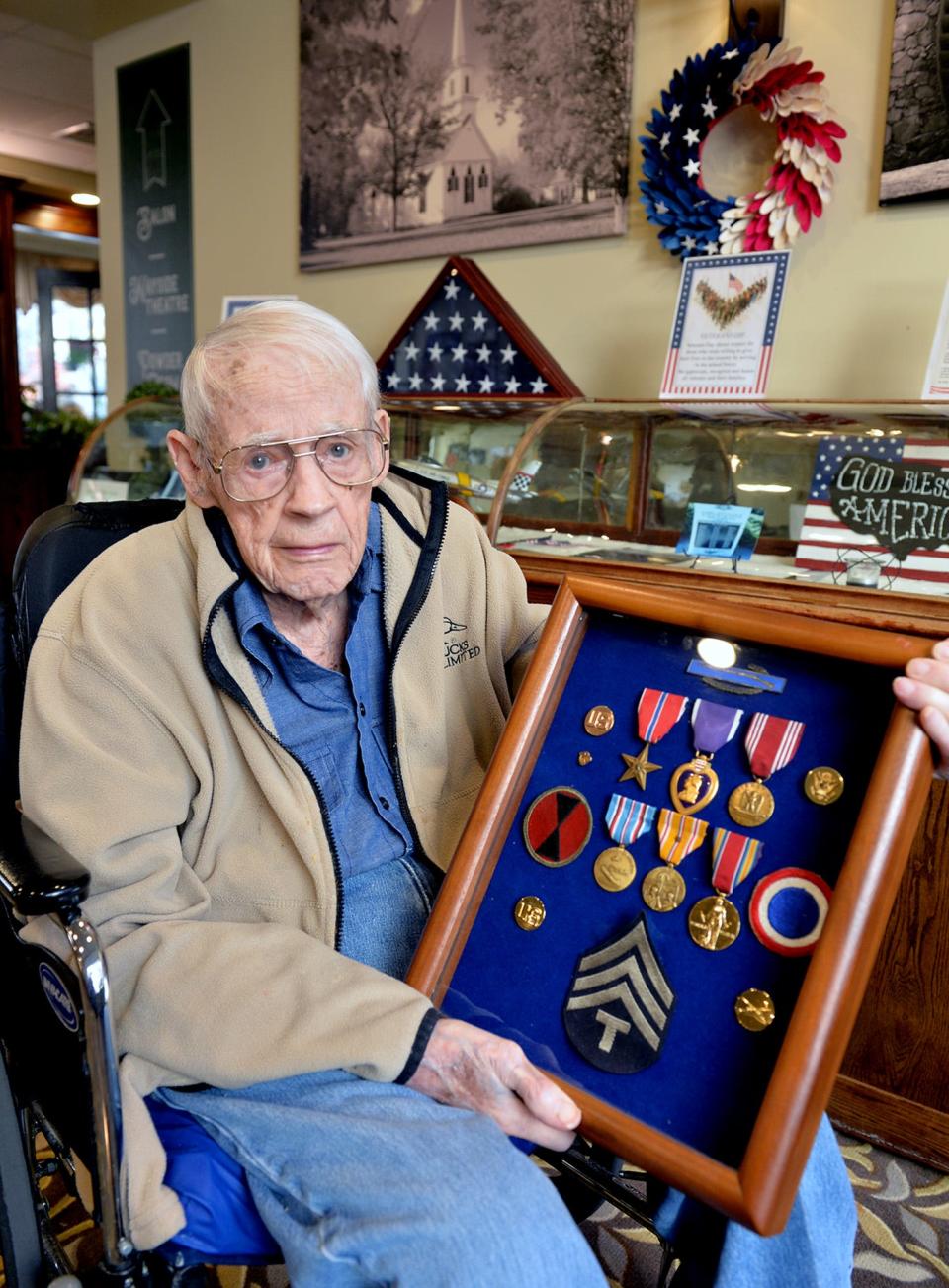 World War II veteran Arthur Butler, 100, lives at the New Horizons assisted living center in Marlborough, Nov. 9, 2021.