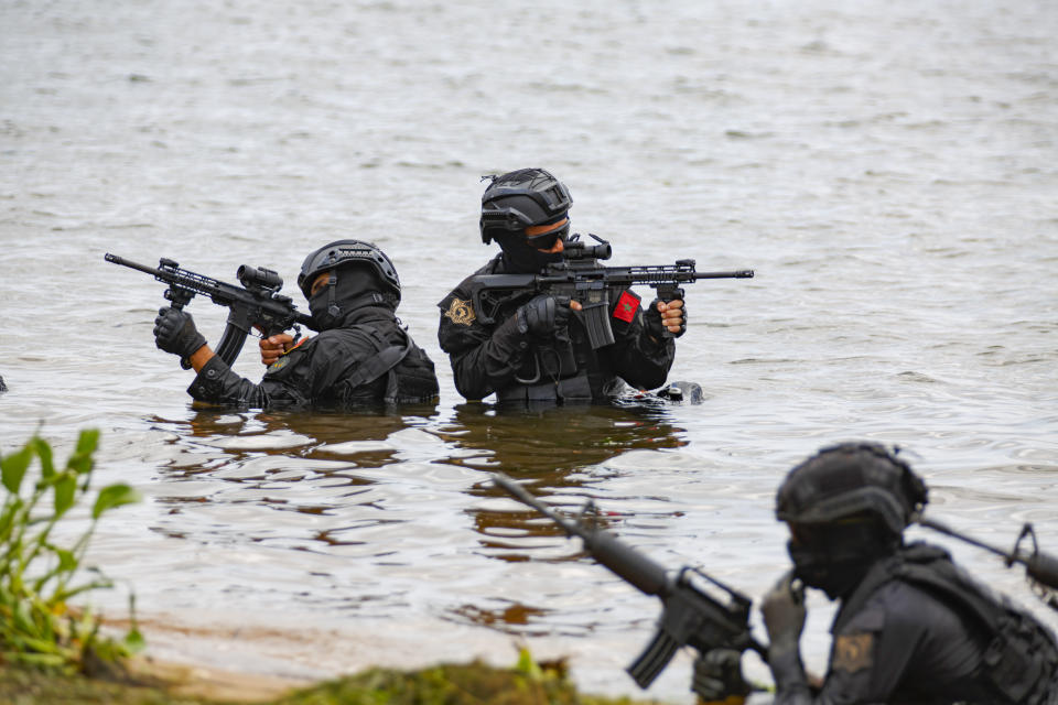 Moroccan soldiers conduct combat drills during Flintlock 2023 at Sogakope beach resort, Ghana, Tuesday, March 14, 2023. As extremist violence in West Africa's Sahel region spreads south toward coastal states, the United States military has launched its annual military training exercise which will help armies contain the jihadi threat. Soldiers from several African countries are being trained in counter-insurgency tactics as part of the annual U.S.-led exercise known as Flintlock. (AP Photo/Misper Apawu)