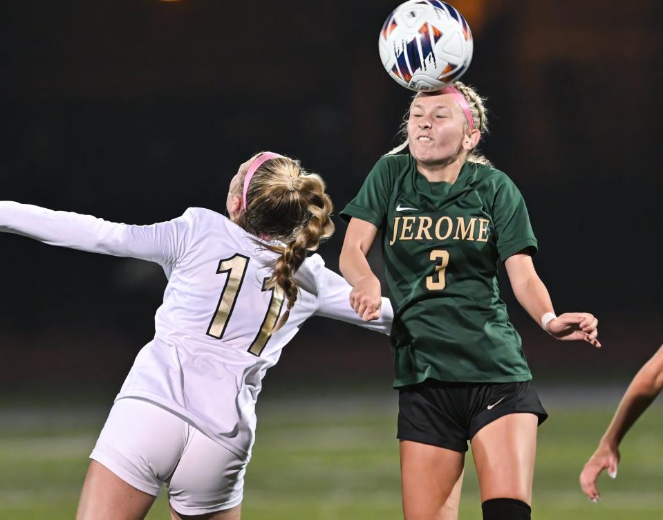 Dublin Jerome’s Ella Fuller and New Albany’s Abby Bojko go for the ball during a Division I regional semifinal Nov. 1, 2022, at DeSales. Jerome won 2-1.