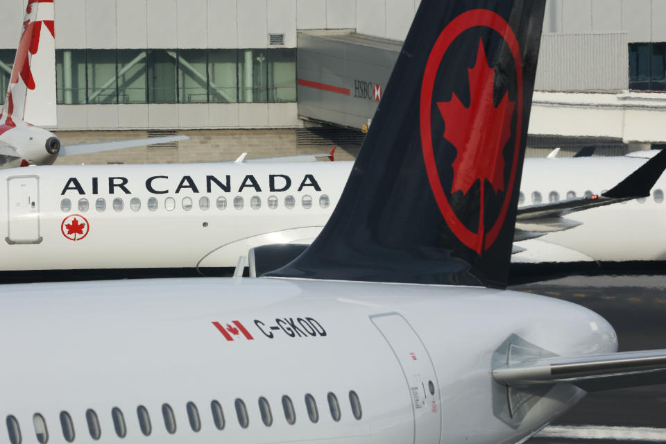 Air Canada planes are seen at the Toronto Pearson Airport in Toronto, Canada on June 12, 2023. (Photo by Jakub Porzycki/NurPhoto via Getty Images)