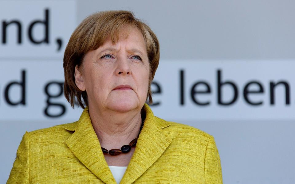 German Chancellor Angela Merkel's controversial “open-door” refugee policy saw more than one million asylum-seekers flood into Germany - EPA