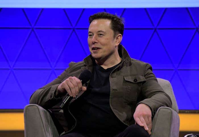 Elon casually dressed and speaking during an interview