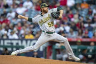 Oakland Athletics starting pitcher Paul Blackburn throws to a Los Angeles Angels batter during the first inning of a baseball game in Anaheim, Calif., Friday, May 20, 2022. (AP Photo/Alex Gallardo)