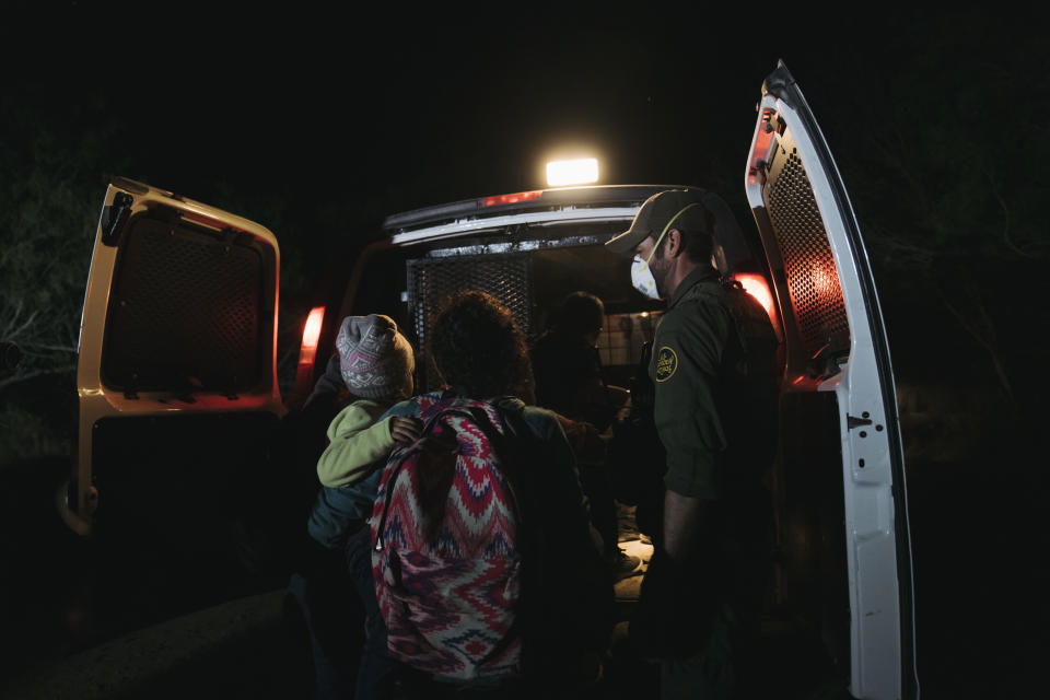 Migrants are processed by U.S. Border Patrol agents after illegally crossing the border over the Rio Grande River in Roma, Texas, U.S., on Tuesday, April 28, 2021.   / Credit: Eric Thayer/Bloomberg via Getty Images