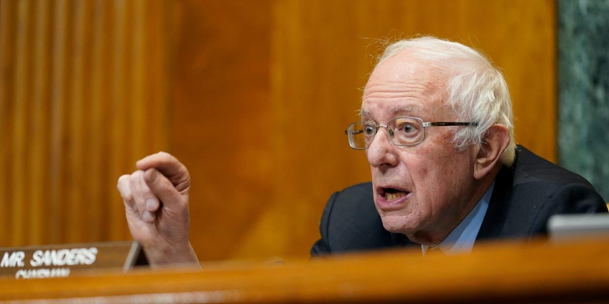 Bernie Sanders pointing and speaking at a hearing.