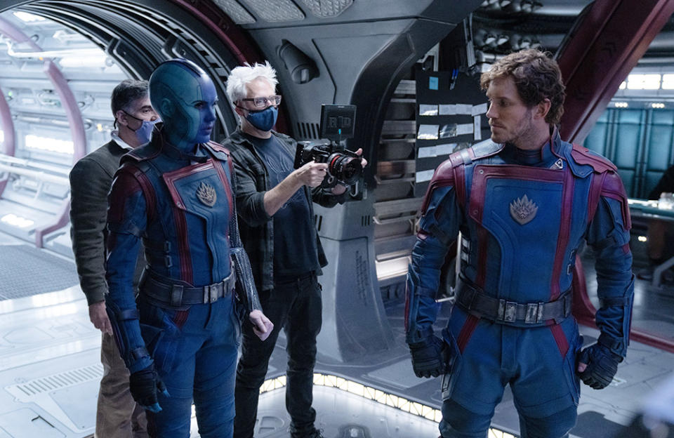 (L-R): Karen Gillan, James Gunn, and Chris Pratt on the set of Marvel Studios' GUARDIANS OF THE GALAXY VOL. 3.