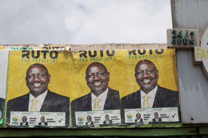 FILE PHOTO: A views shows posters of Kenya's Deputy President William Ruto and presidential candidate on top of the Silverline Butchery restaurant in Eldoret