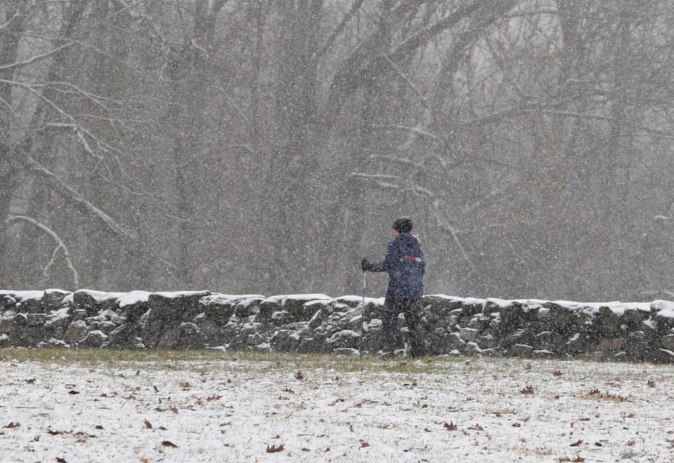 A cross-country skier takes to Brandywine Creek State Park as snow begins to drape the area in December of 2017.