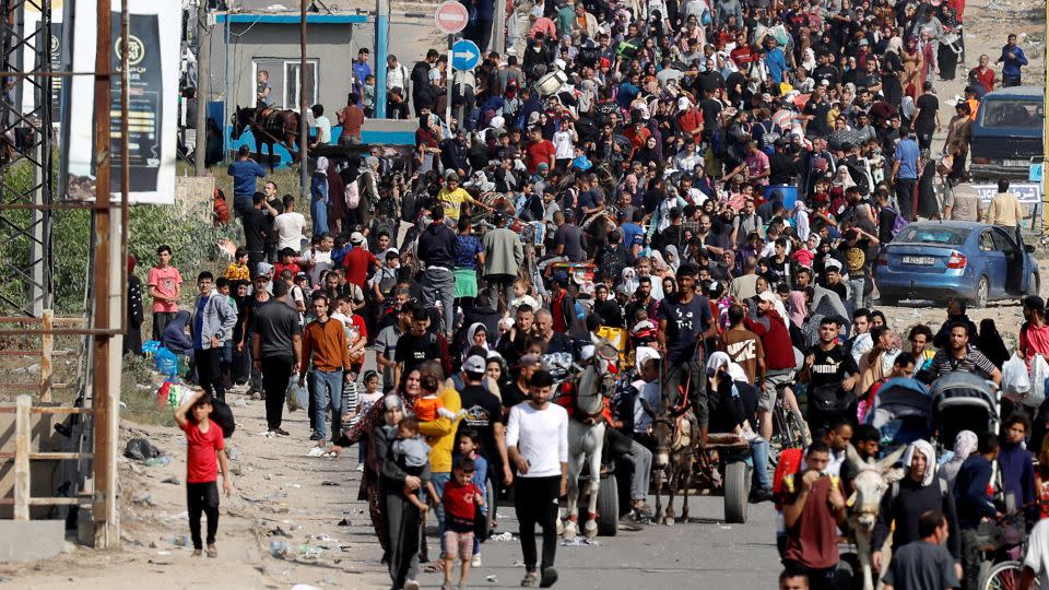 Palestinians flee north Gaza on Thursday. - Mohammed Salem/Reuters