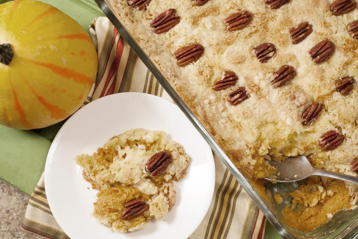 Baked pumpkin cobbler for Thanksgiving dinner.  No people in holiday baking scene.