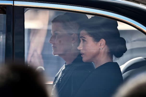 PHOTO: Britain's Sophie, Countess of Wessex  and Meghan, Duchess of Sussex are driven behind the coffin of Queen Elizabeth II, during a procession from Buckingham Palace to the Palace of Westminster, in London, Sept. 14, 2022.  (Marco Bertorello/AFP via Getty Images)