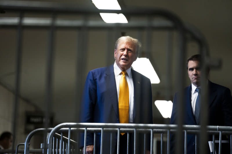 Former President Donald Trump speaks to reporters at the end of the sixth day of his criminal trial at Manhattan criminal court on Thursday. Trump's trial is in its third week on charges he allegedly falsified business records to cover up a sex scandal during the 2016 presidential campaign. Pool photo by Doug Mills/UPI