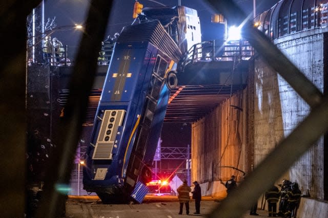 APTOPIX Bus Crash Overpass