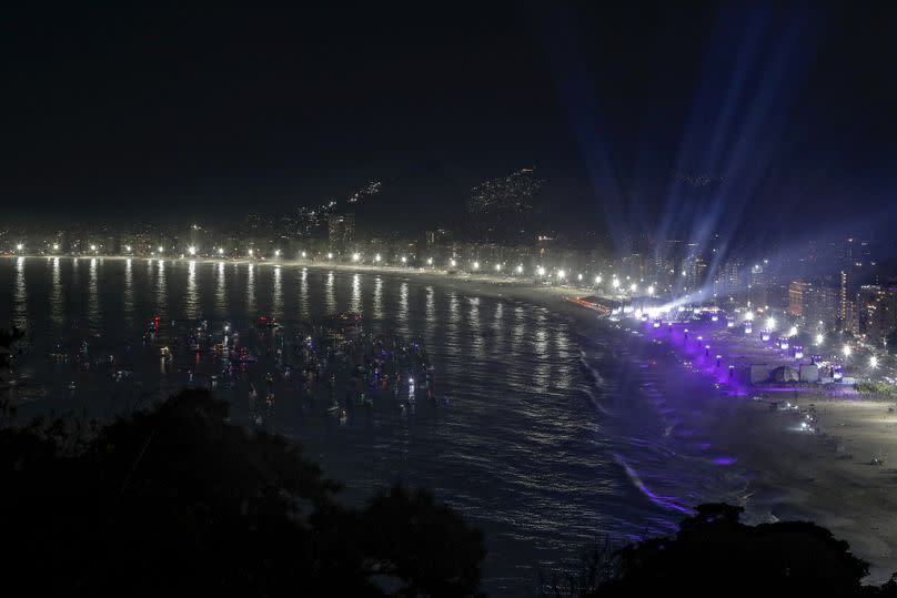 From apartment buildings and hotels, to the sand and the sea, fans gathered across the elements to catch Madonna's free show.