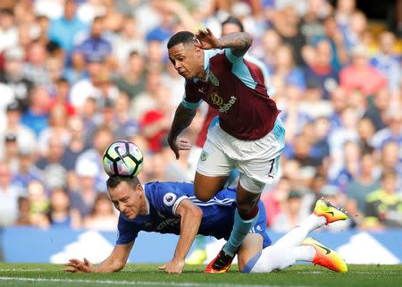 Football Soccer Britain - Chelsea v Burnley - Premier League - Stamford Bridge - 27/8/16 Burnley's Andre Gray in action with Chelsea's John Terry Action Images via Reuters / Andrew Couldridge Livepic