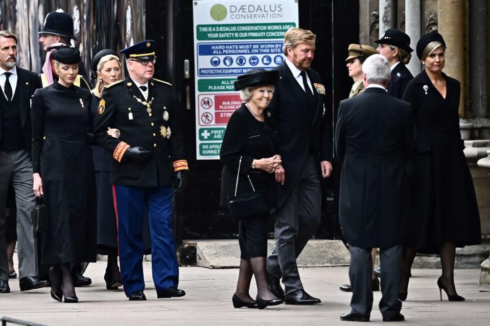 Monaco's Prince Albert II and his wife Charlene (L), Netherlands' Princess Beatrix (C), King Willem-Alexander of the Netherlands (C, R) and Queen Maxima of the Netherlands (R) arrive at Westminster Abbey in London on September 19, 2022, for the state funeral service for Britain's Queen Elizabeth II.<span class="copyright">Marco Bertorello/AFP—Getty Images</span>