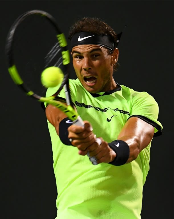 Rafael Nadal of Spain returns a shot during his Miami Open quarter-final match against Jack Sock of the US, at Crandon Park Tennis Center in Key Biscayne, Florida, on March 29, 2017