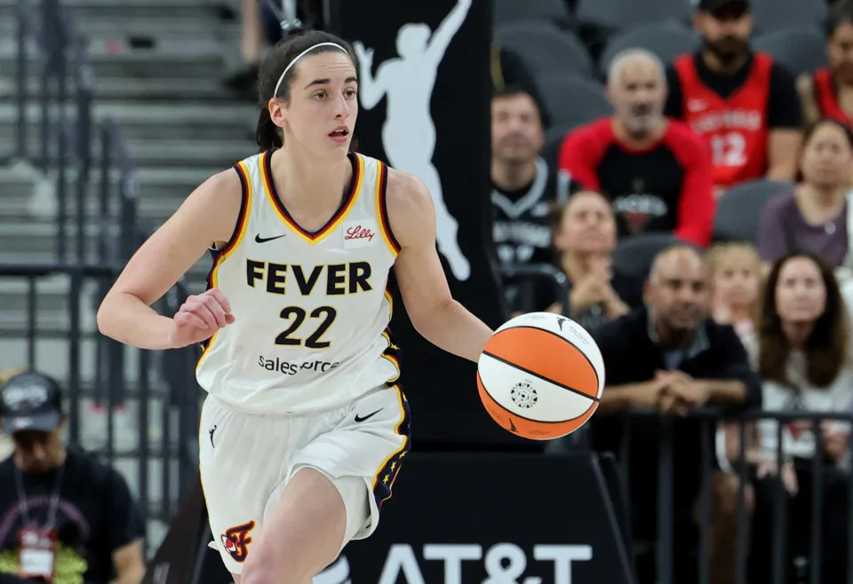 LAS VEGAS, NEVADA - JULY 02: Caitlin Clark #22 of the Indiana Fever brings the ball up the court against the Las Vegas Aces in the first quarter of their game at T-Mobile Arena on July 02, 2024 in Las Vegas, Nevada. The Aces defeated the Fever 88-69. NOTE TO USER: User expressly acknowledges and agrees that, by downloading and or using this photograph, User is consenting to the terms and conditions of the Getty Images License Agreement. (Photo by Ethan Miller/Getty Images)