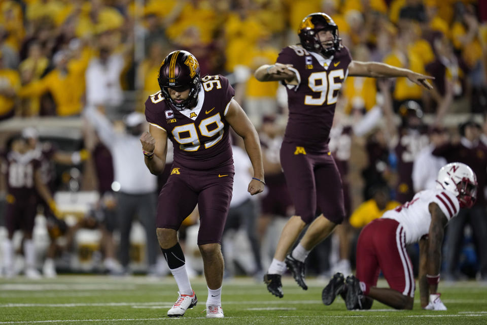 Minnesota place-kicker Dragan Kesich (99) celebrates after making a field goal on the final play to give Minnesota a 13-10 win over Nebraska in an NCAA college football game Thursday, Aug. 31, 2023, in Minneapolis. (AP Photo/Abbie Parr)