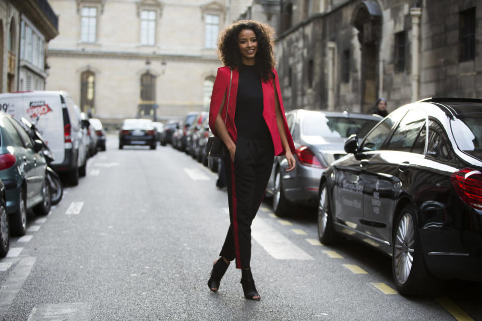 Tina Leung in a caped blazer and track pants at the spring/summer 2016 haute couture shows in Paris.