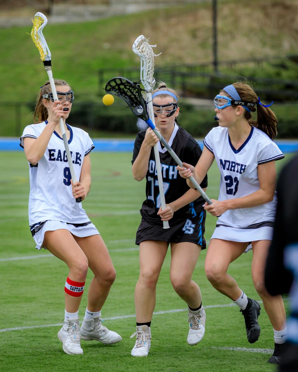 Annika Pyy, left, scored 102 goals in her first 20 games with the Plymouth North girls lacrosse program.