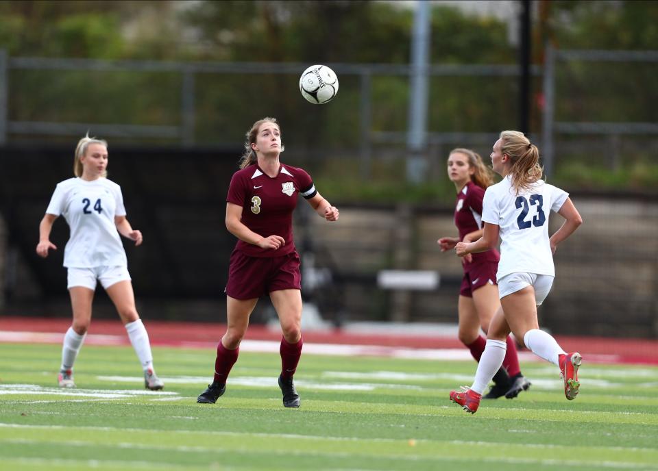 Arlington Casey Stowell (3) gains possession of the ball during their 2-0 win over John Jay-East Fishkill in the girls Section 1 Class AA soccer championship game at Nyack High School on Sunday, October 31, 2021. 