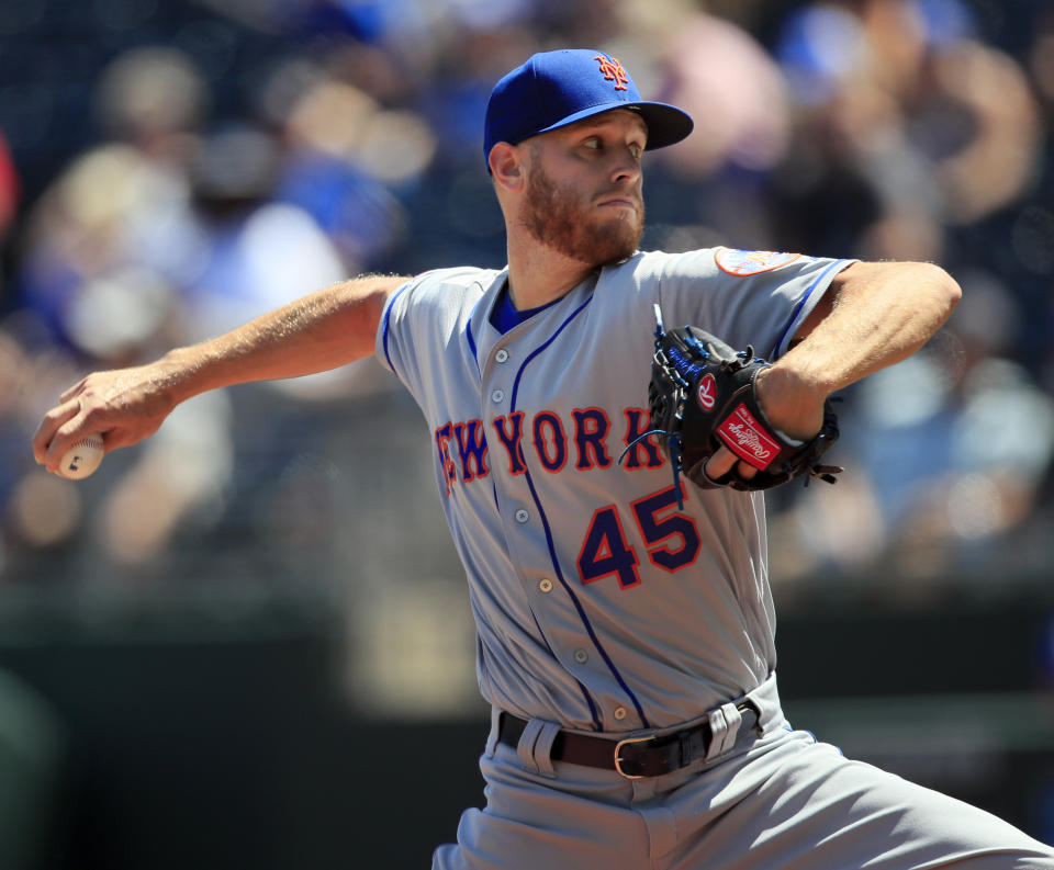 New York Mets starting pitcher Zack Wheeler delivers to a Kansas City Royals batter during the first inning of a baseball game at Kauffman Stadium in Kansas City, Mo., Sunday, Aug. 18, 2019. (AP Photo/Orlin Wagner)