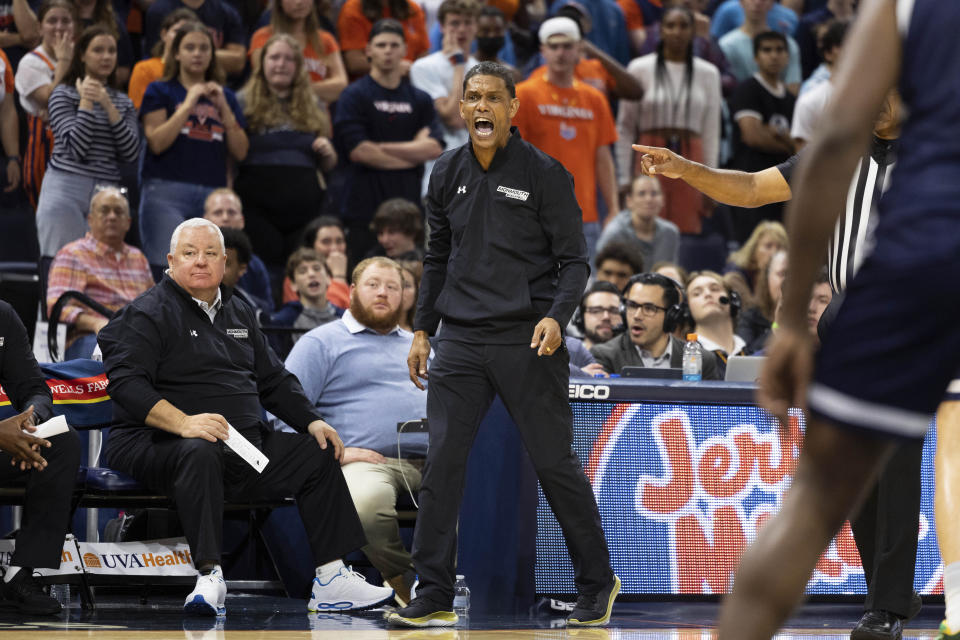 Monmouth head coach King Rice yells during the first half of an NCAA college basketball game against Virginia in Charlottesville, Va., Friday, Nov. 11, 2022. (AP Photo/Mike Kropf)