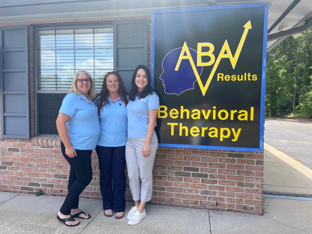 ABA Results Founder and CEO Jennifer Andoscia (middle) stands with Tania Lange (left) and Clinical Director Michelle Goike (right) for the facility's grand opening.