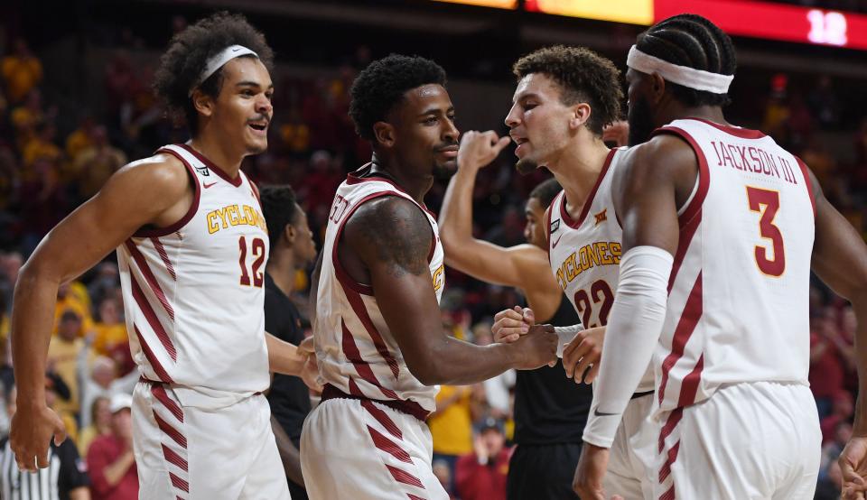 From left, Iowa State’s Robert Jones, Izaiah Brockington, Gabe Kalscheur and Tre Jackson react after a three-point play against Oregon State on Nov. 12 in Ames.