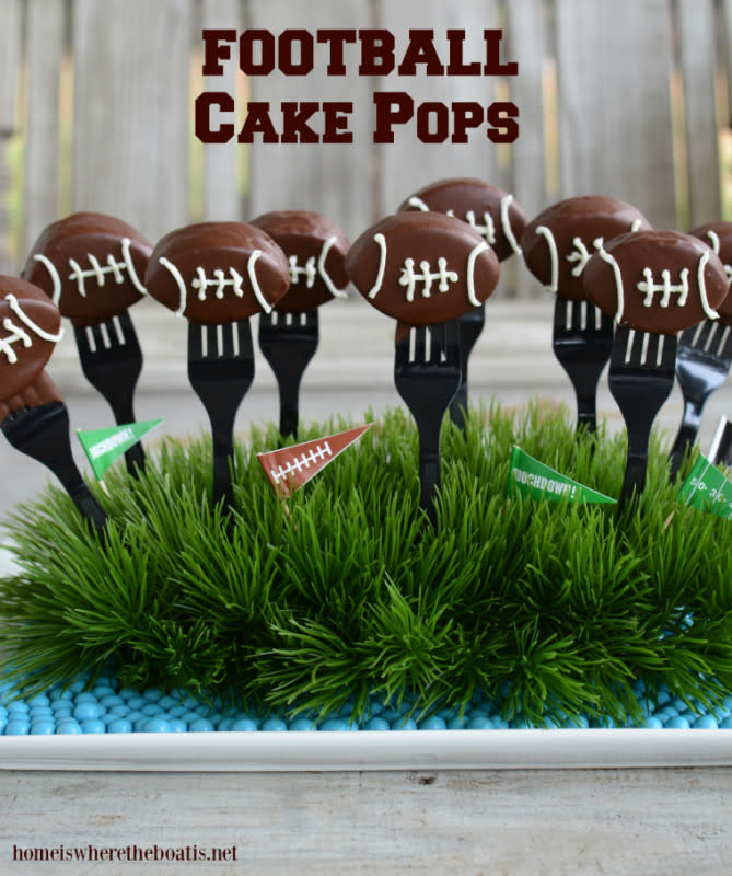 <p>Home is Where the Boat is</p><p><strong>Get the recipe: </strong><a href="https://homeiswheretheboatis.net/2016/02/05/keep-pounding-football-cake-pops/" rel="nofollow noopener" target="_blank" data-ylk="slk:Football Cake Pops;elm:context_link;itc:0;sec:content-canvas" class="link "><strong>Football Cake Pops</strong></a></p>