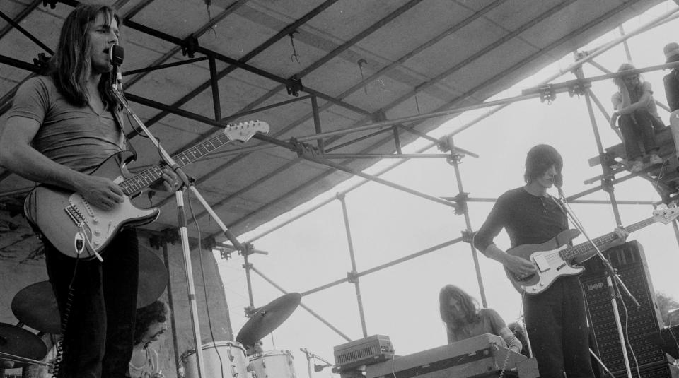 (from left) Pink Floyd's David Gilmour, Nick Mason, Rick Wright and Roger Waters perform onstage at Hyde Park in London on July 18, 1970