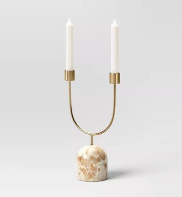 A stone and metal candlestick